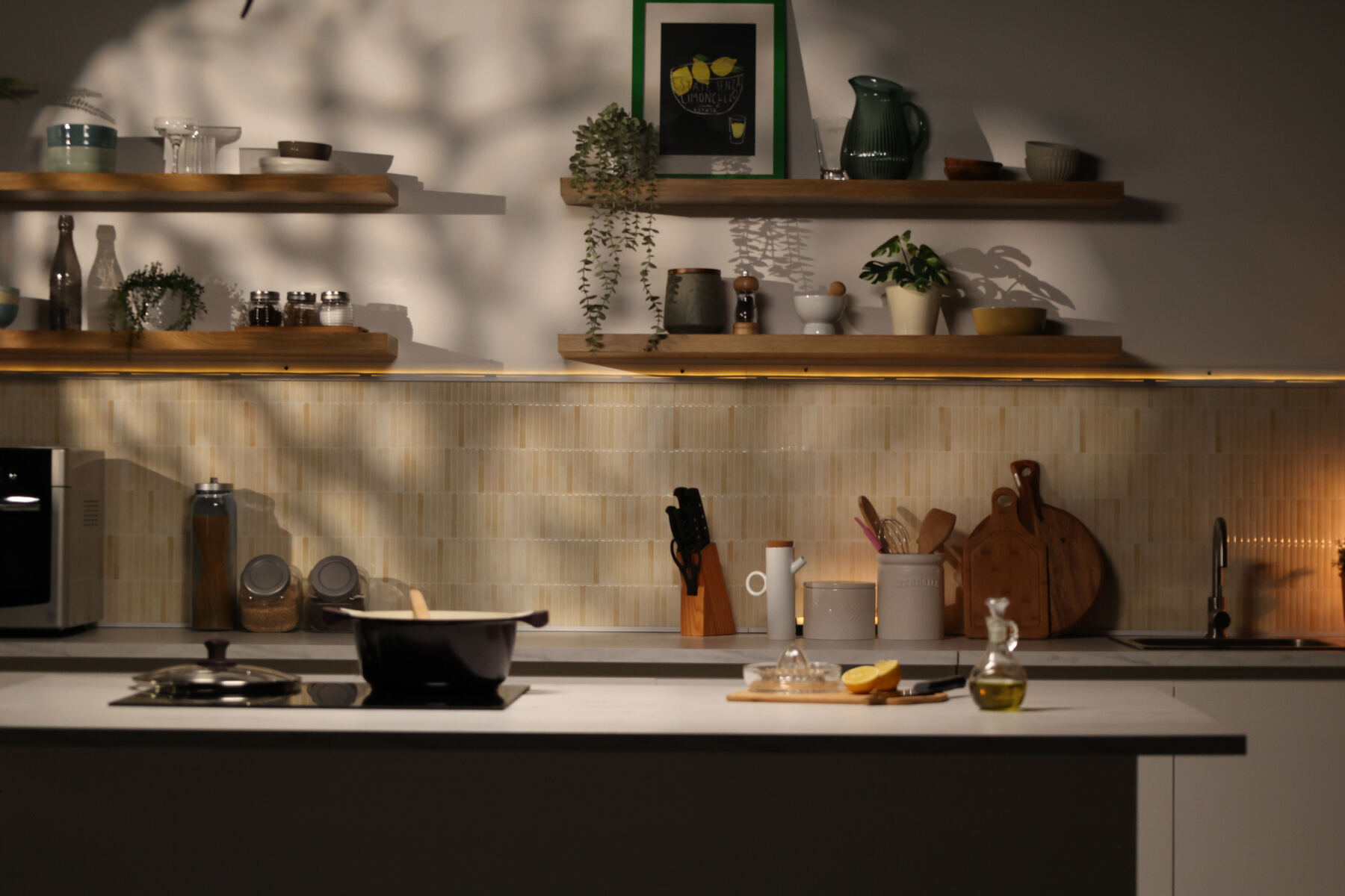 Overhead flat-lay of styled food ingredients, ceramic plates and props on a warm surface